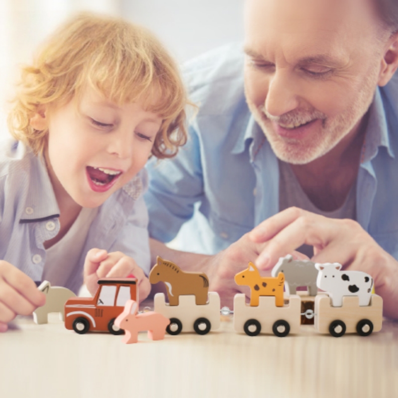 Kleurrijk houten duwtreintje m - Baby Nursery Music recensie en prijs